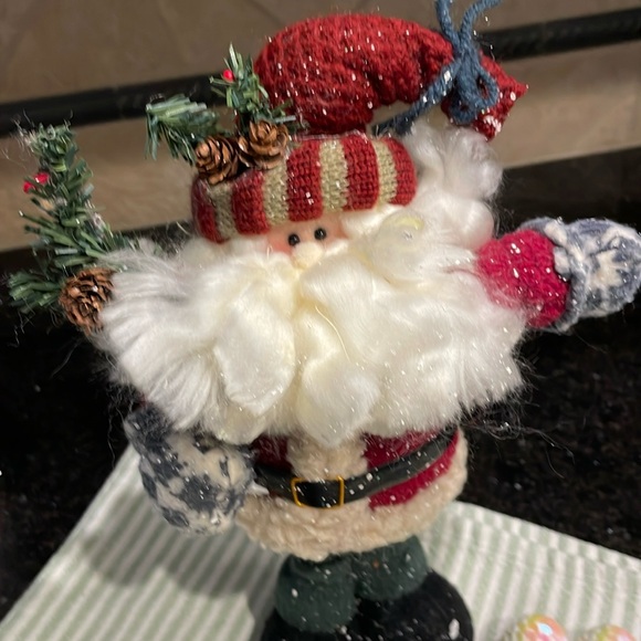 Father Christmas stands proudly with his fluffy beard, pine branches and snow - Picture 2 of 10